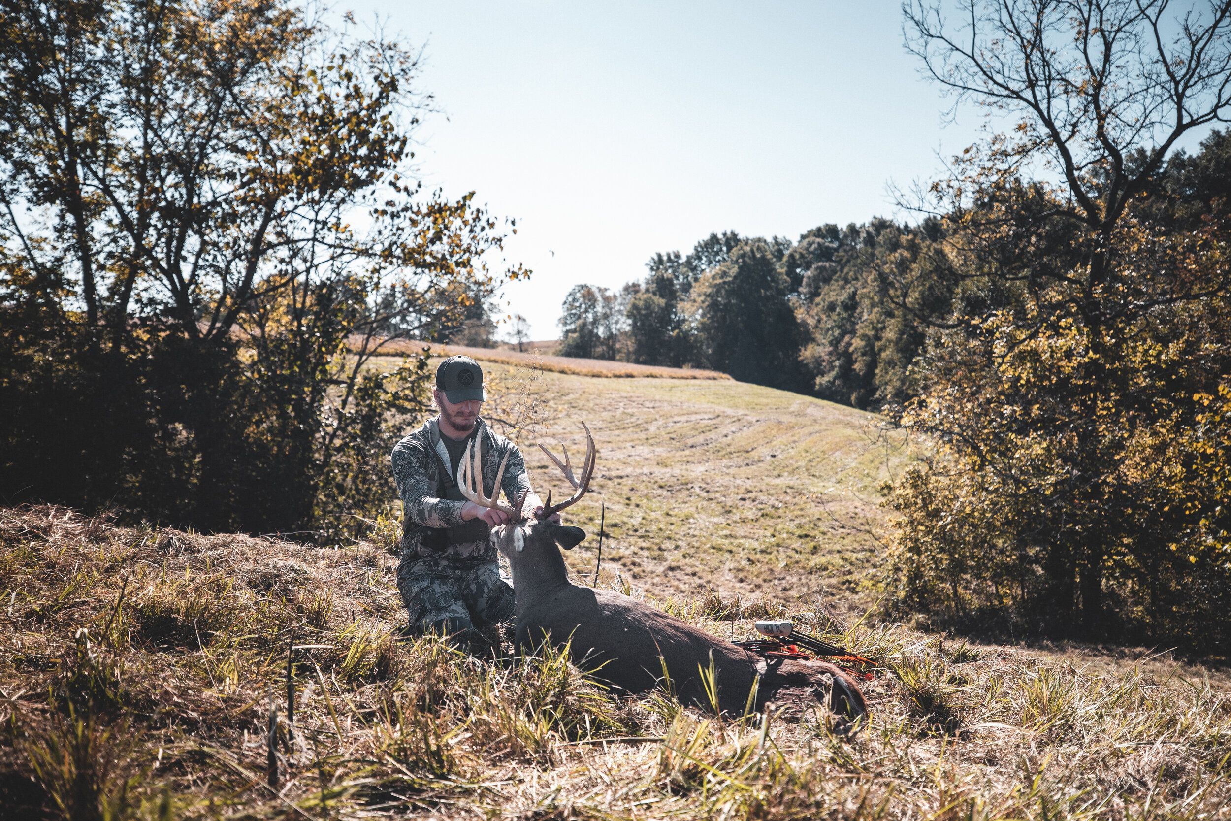 A hunter prepares to carry out a deer kill to avoid coyotes. 