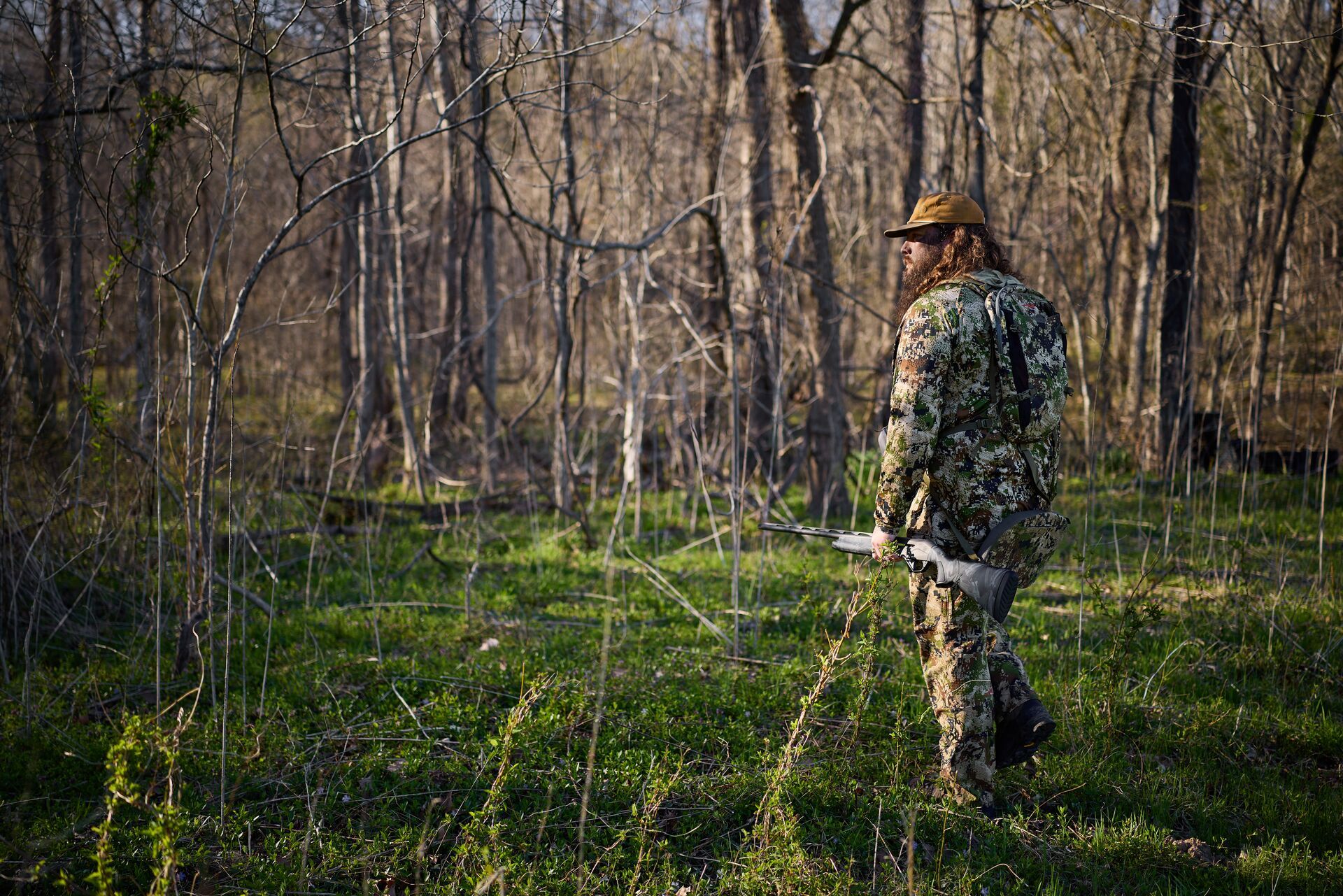 Ben Cole of RootedTV in turkey gear in the woods, best turkey vest concept. 