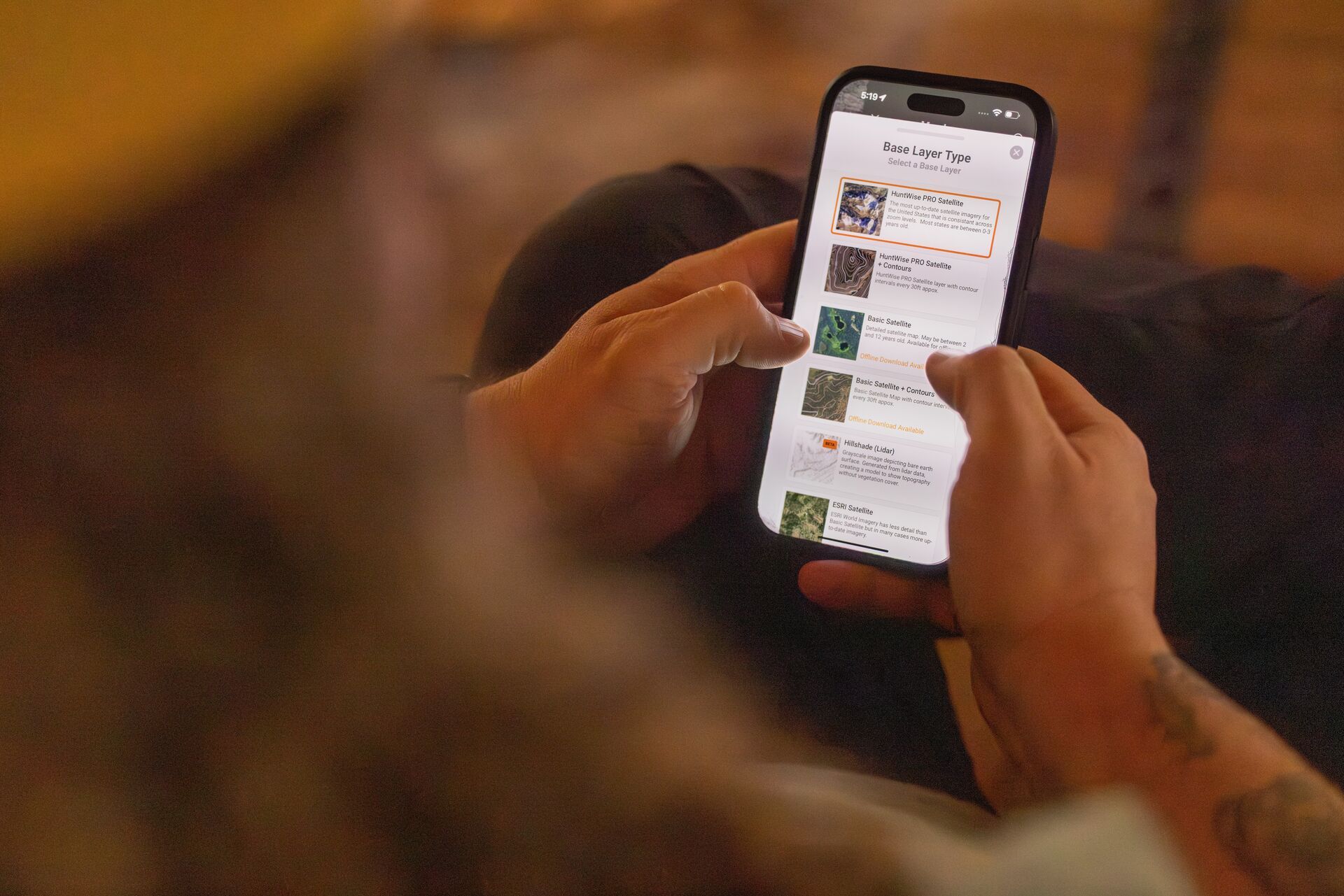 Hunter selecting map layers in the HuntWise app.