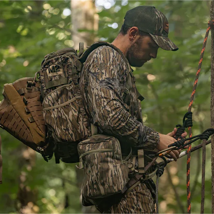 Hunter using Tethrd Workhorse saddle kit, best hunting saddles concept. 