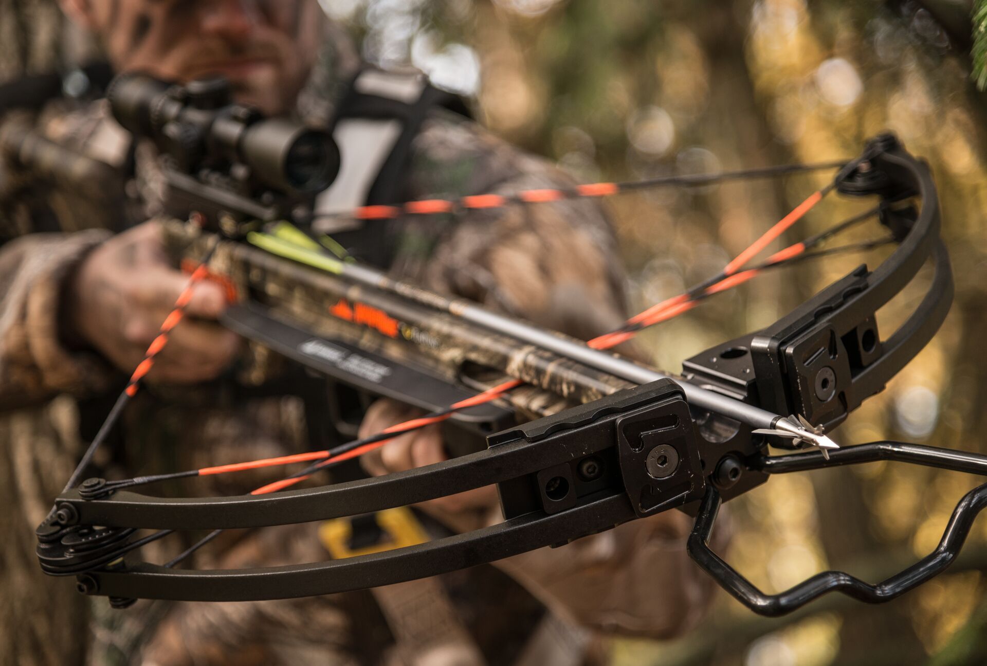 Close-up of an arrow set in a crossbow. 