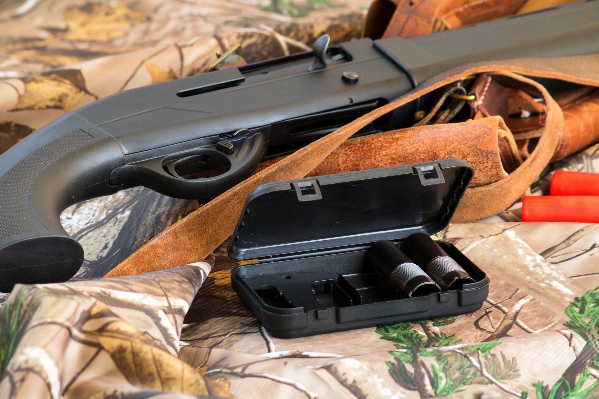 Chokes next to a shotgun, what's the best choke for dove hunting concept. 