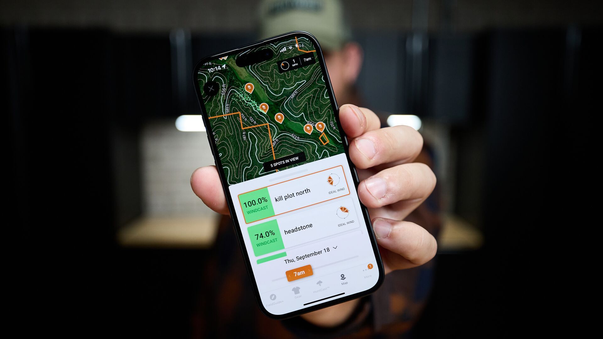 Close-up of WindCast on phone screen, best hunting weather app concept. 