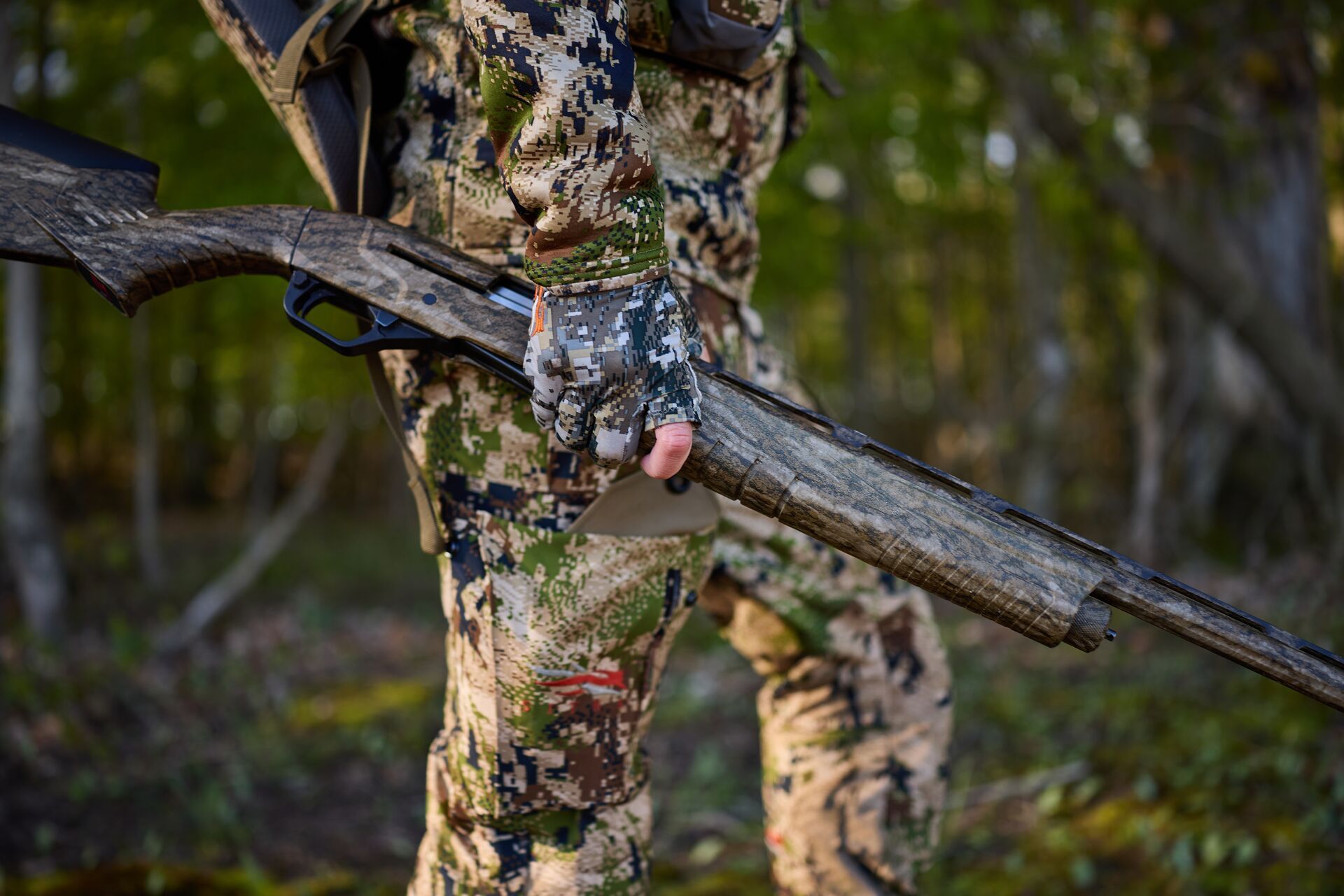 Hunter with semiautomatic shotgun, types of shotgun concept. 