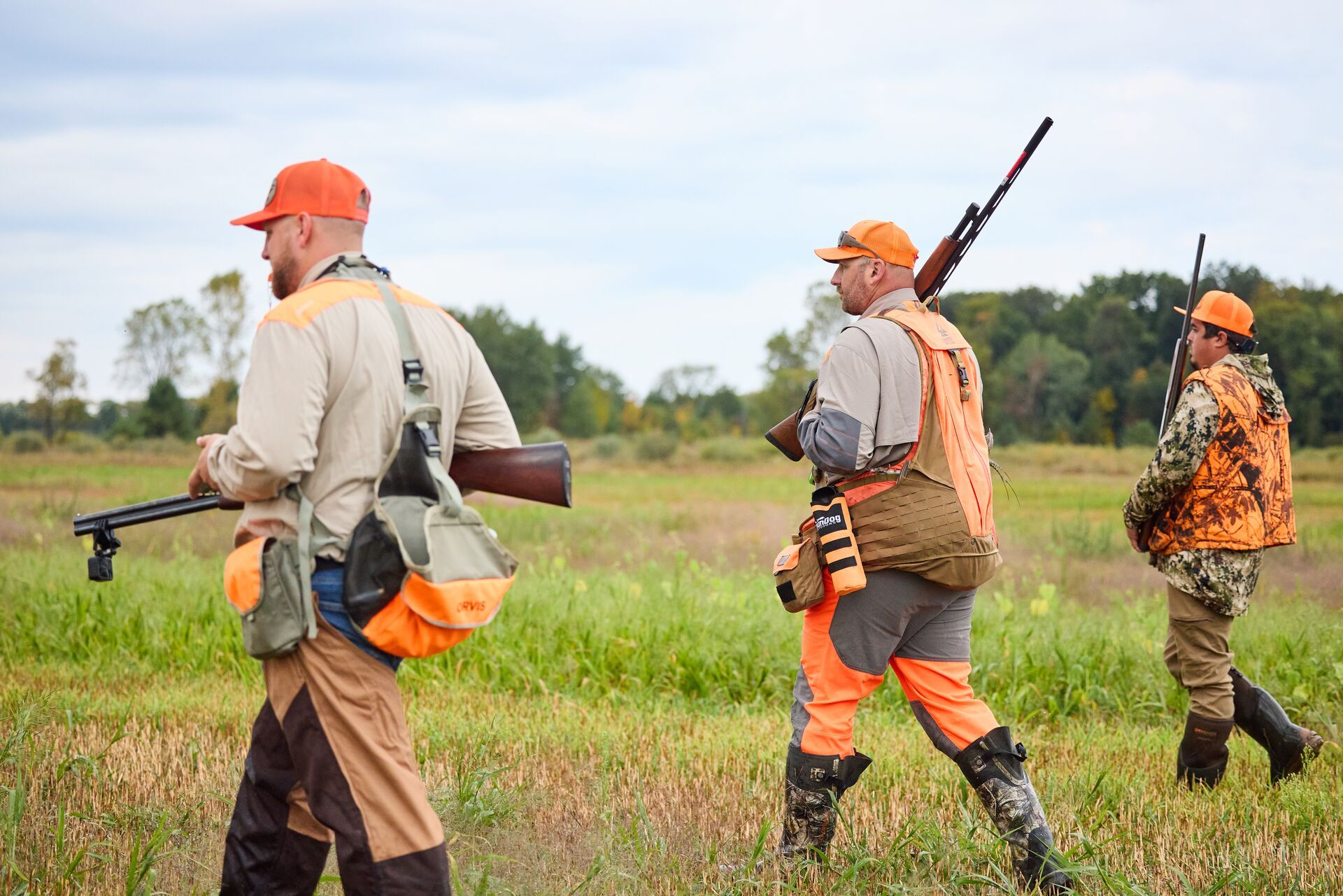 FGBLOG hunters in blaze orange with shotguns for pheasant hunt.jpeg