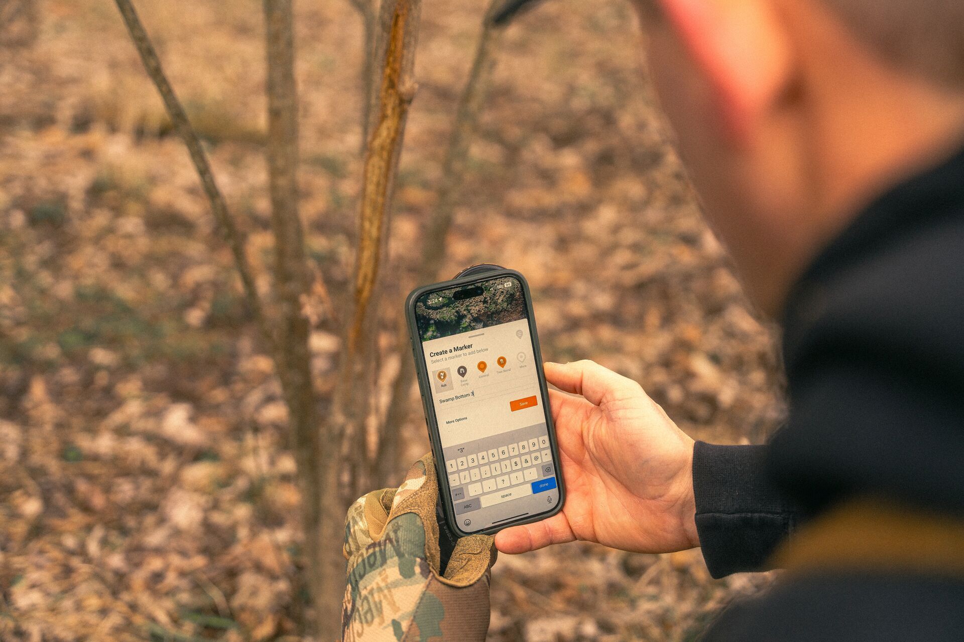 Hunter marks deer sign in the HuntWise app.