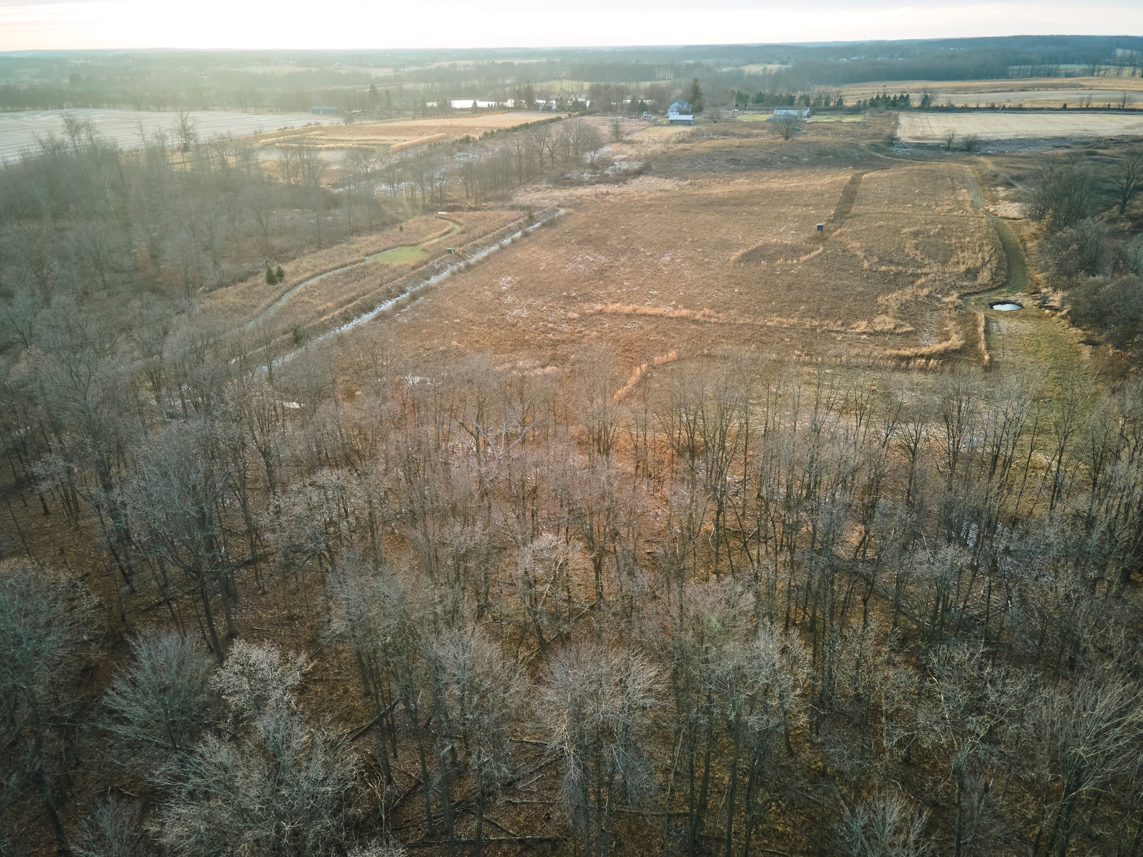 A drone view of hunting land, use a hunting app to plan a path concept. 