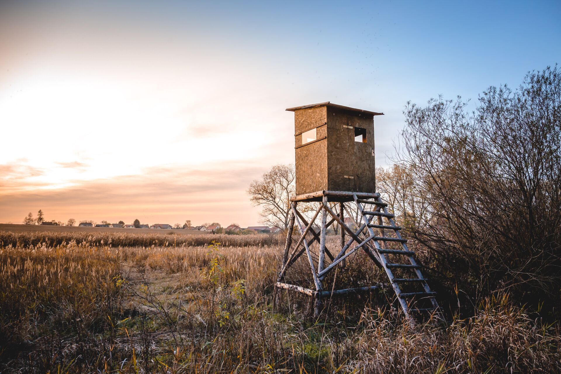 A hunting blind in a field, stay in the hunting blind all day for gun season opening day concept. 